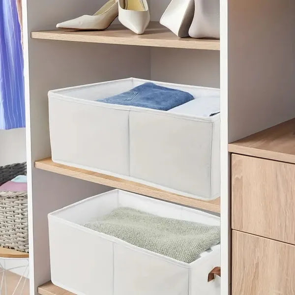Foldable storage boxes stacked in a closet