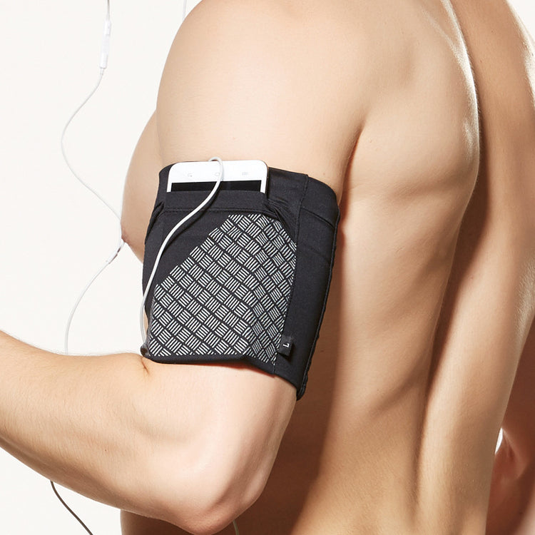 Armband shown flat to display its stretch fabric construction