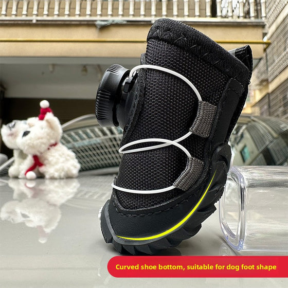 Black dog boot with a curved sole and reflective strip