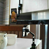 Rearview mirror phone mount clamped to mirror stem, front view
