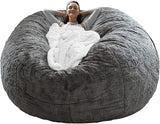 Dark grey bean bag chair cover empty and unfilled flat on the floor