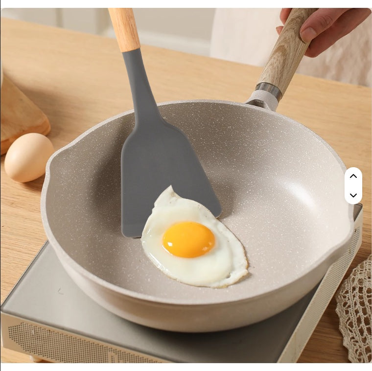 Silicone utensils ladle and serving spoon close up