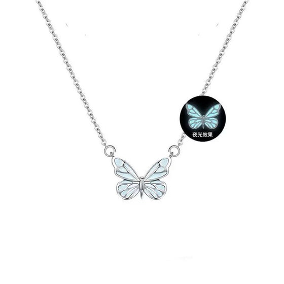 Butterfly pendant necklace with a glowing inset, not included