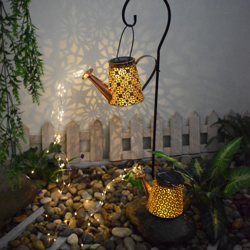 Outdoor waterproof solar-powered perforated projection lamp