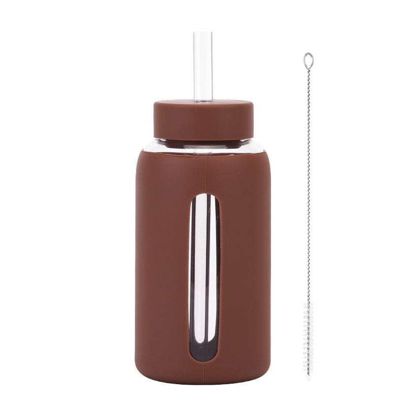 Insulated borosilicate glass cup with straw lid and silicone sleeve