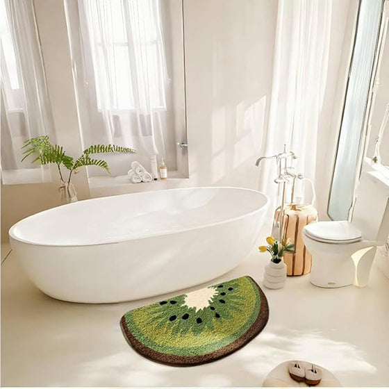 Kiwi bath mat in front of a freestanding tub