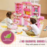 Kids play kitchen stove and oven stations close up