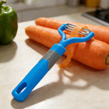Vegetable peeler stainless steel blade close-up