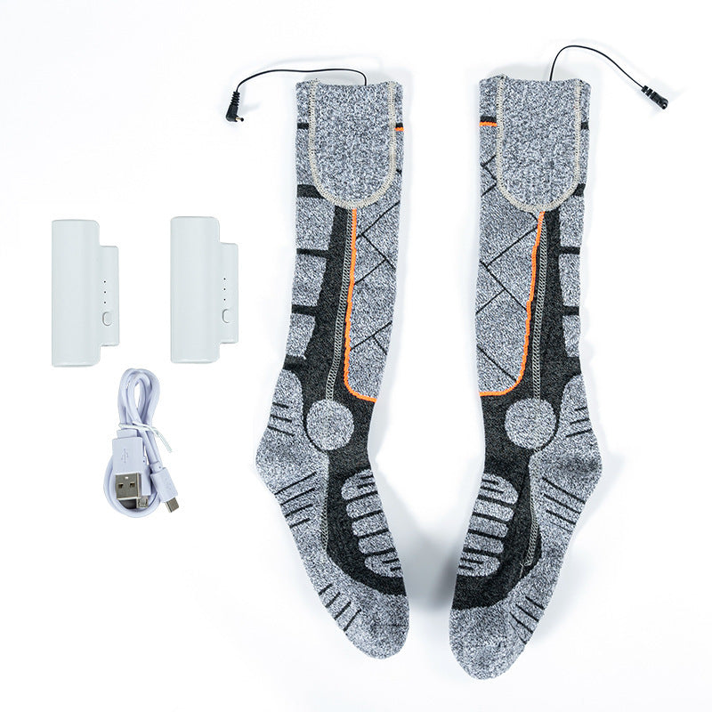 Orange and pink rechargeable electric heated socks with battery pack, photo 4