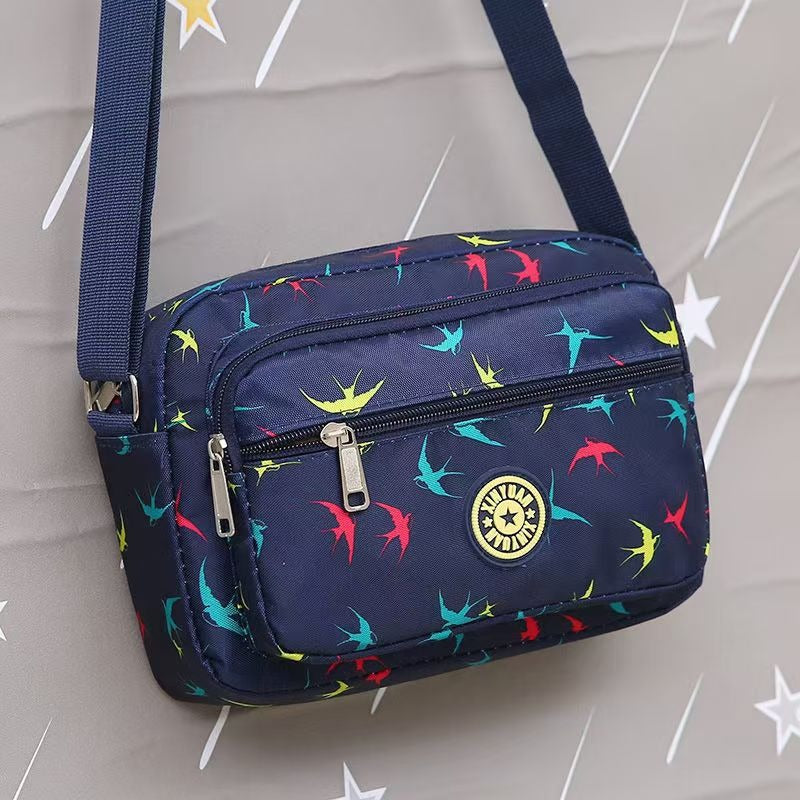 Small printed nylon crossbody bag with zipper, photo 4