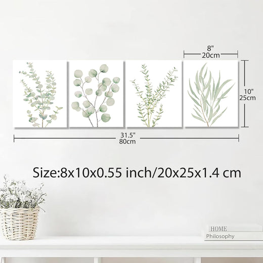 Botanical canvas set displayed above a bathroom sink