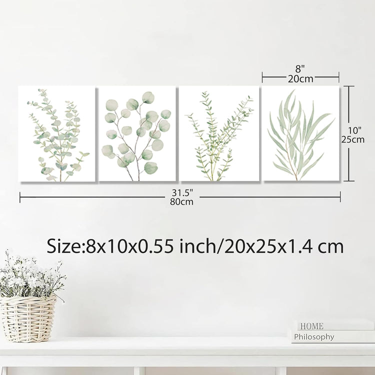 Botanical canvas set displayed above a bathroom sink