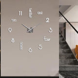 Art deco acrylic wall clock in silver finish