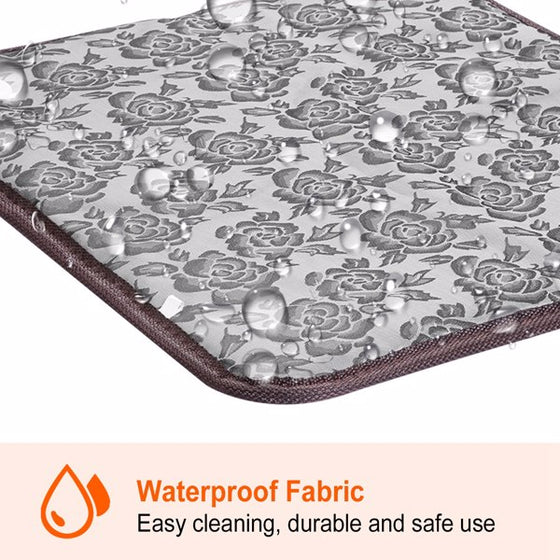 Close-up of the waterproof gray floral cover of the heating pad