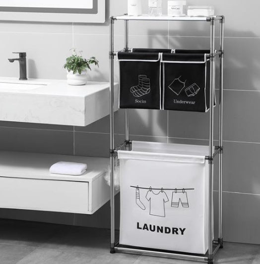 Laundry sorter in a bathroom beside a sink