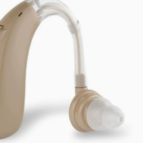 Wireless hearing aid with magnetic attachment