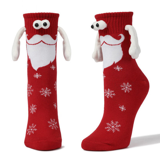 Red Santa Christmas socks with white beards, googly eyes and magnetic hands