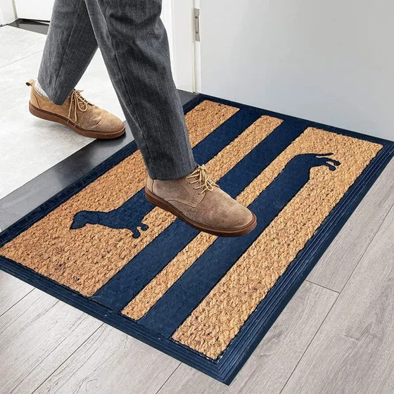 Person wiping shoes on the dachshund coir doormat