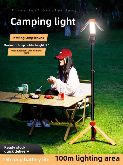 Camping lamp with a stand and lift function