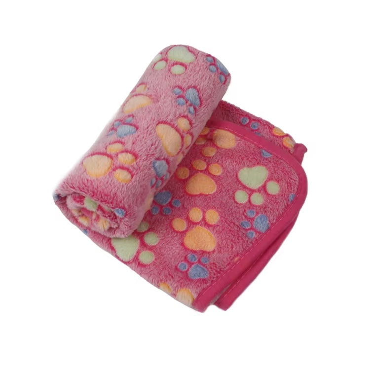 Pink paw print fleece pet blanket rolled up