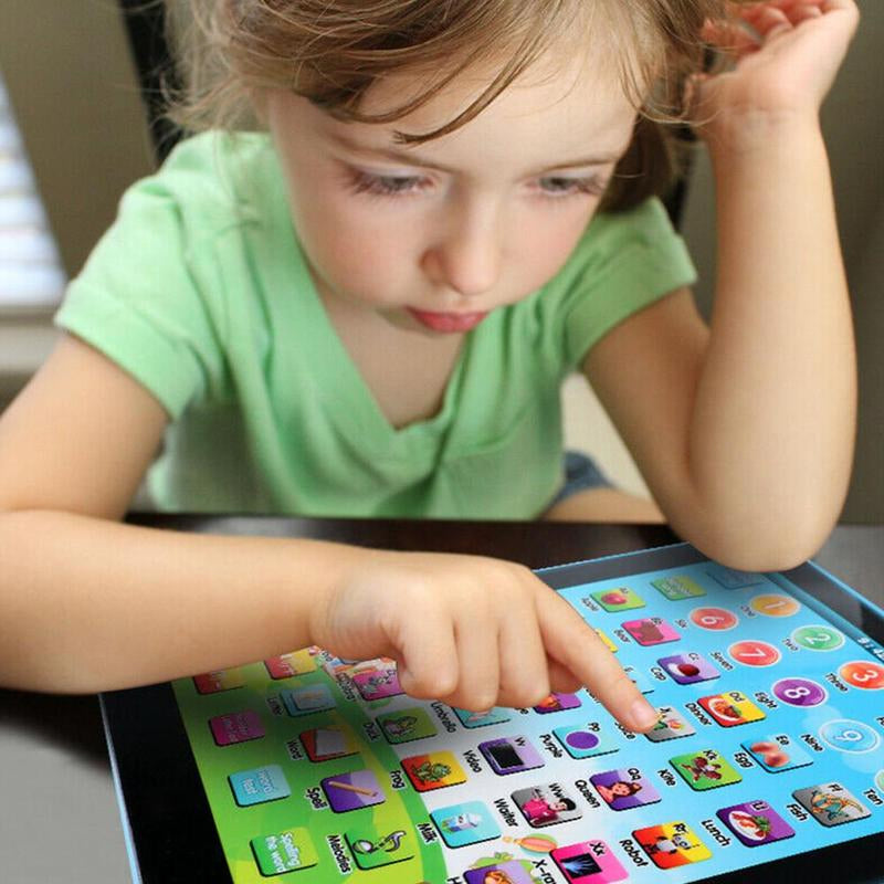 Girl touching the picture keys of the mini learning tablet