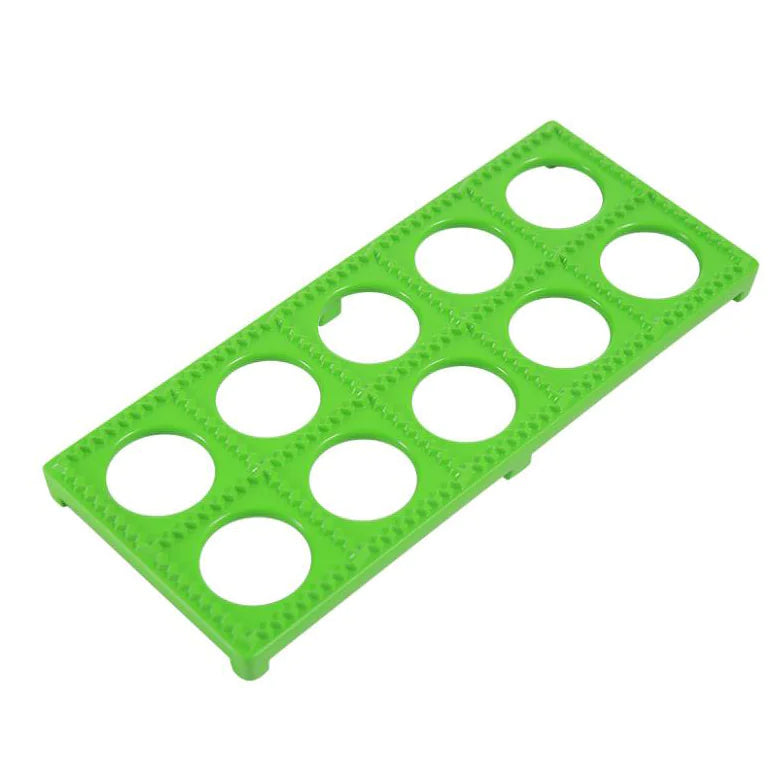Finished ravioli pieces stacked after using the press mold