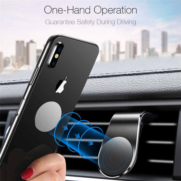 Magnetic car air vent phone holder with smartphone attached