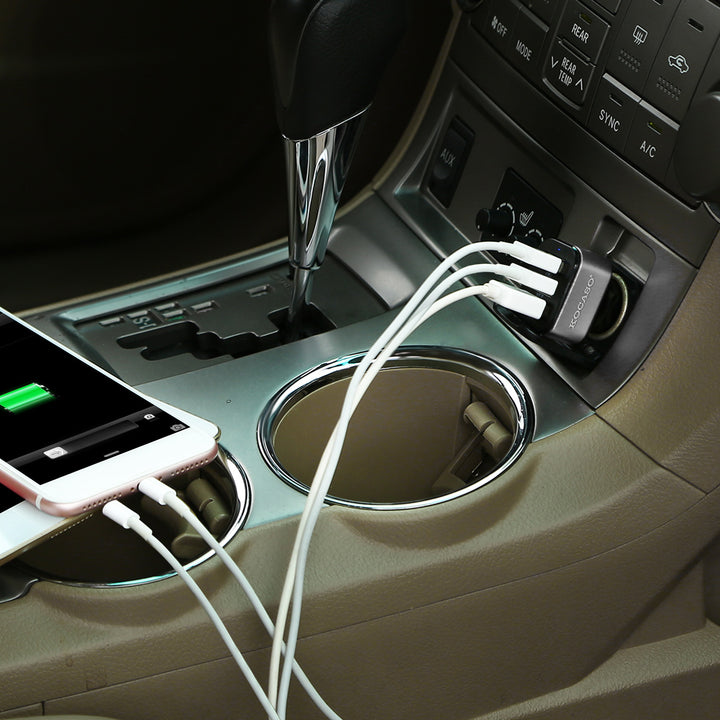Car charger charging phone in vehicle