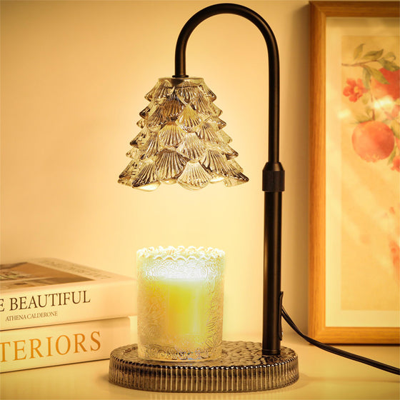 Candle warmer lamp with glass flower shade over a jar candle