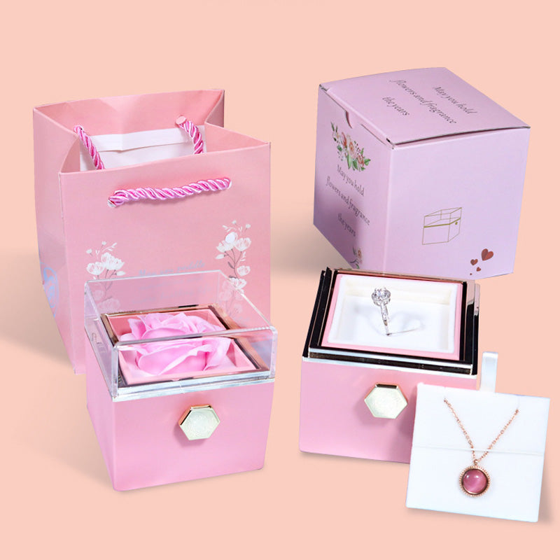 Pink rotating rose jewelry box with pink paper box, gift bag and necklace card