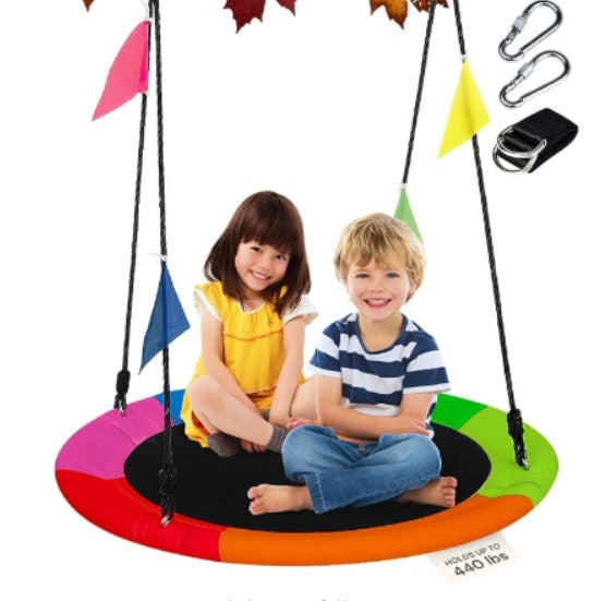 Rainbow disc swing set up for garden play