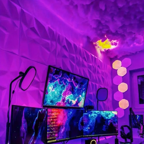 Purple glowing cloud lamp above a gaming desk setup