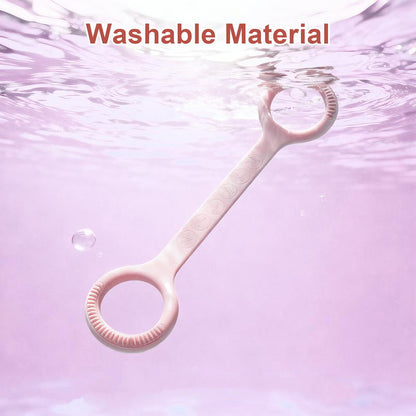 Pink silicone band laid flat showing figure 8 shape