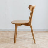 Wood dining chair backrest close-up