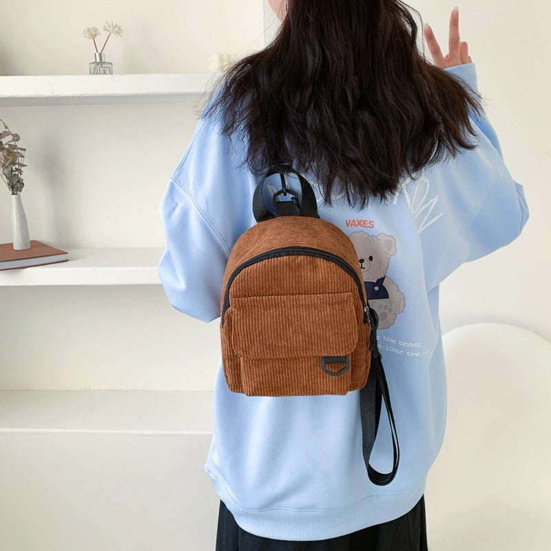 Women's corduroy mini backpack, side angle view