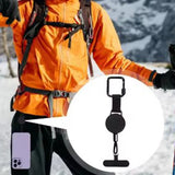 Retractable phone lanyard attached to phone case loop