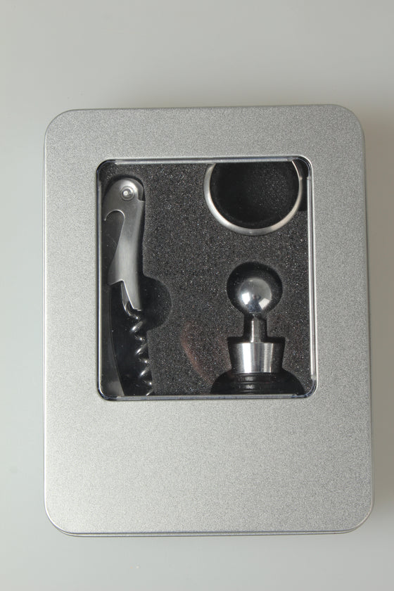 Wine opener set inside the silver gift tin