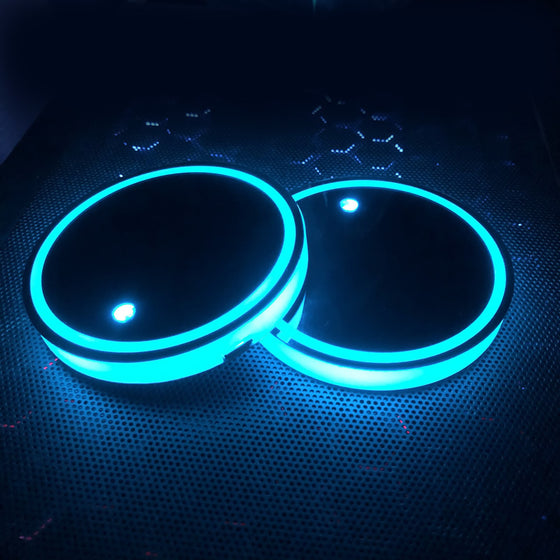 LED coasters glowing cyan