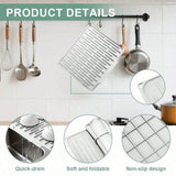 Wet dishes draining on the raised grid silicone mat