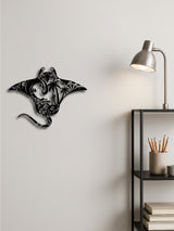 Coastal metal wall art shown in a bedroom