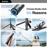 Smartphone mounted in selfie stick tripod phone cradle