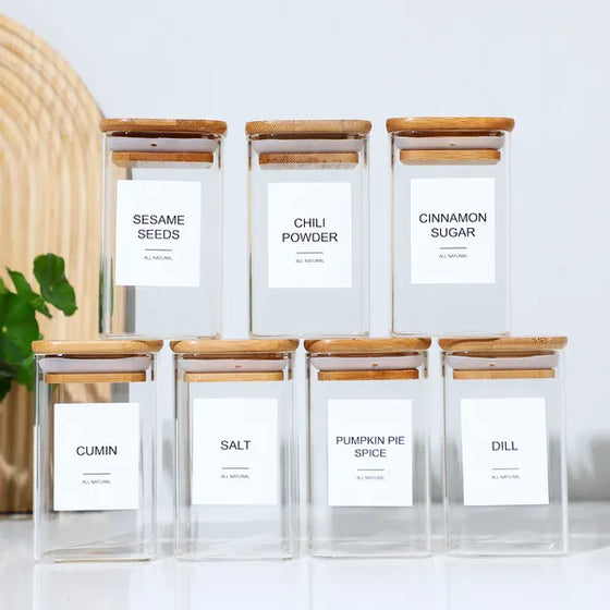 Labeled square spice jars with bamboo lids