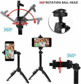 Selfie stick tripod phone clamp holding a smartphone