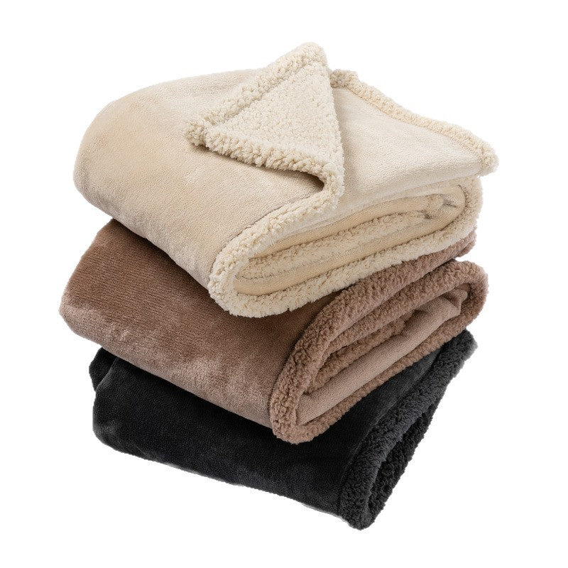 Reversible flannel and sherpa pet blanket on a sofa, photo 5