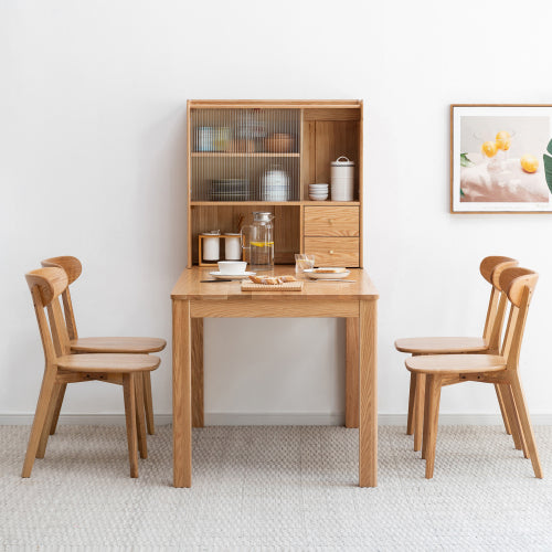 Modern oak dining chairs grouped together