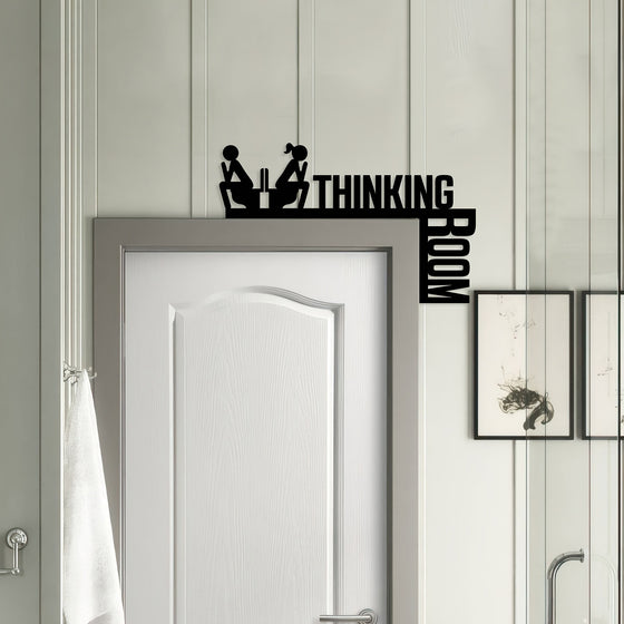 Thinking Room bathroom sign over a white door with toilet silhouette
