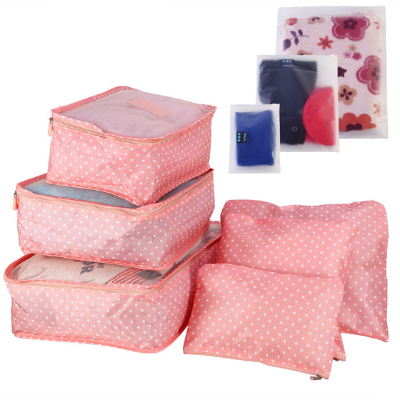 Pink polka dot packing cube set with pouches and floral storage bags