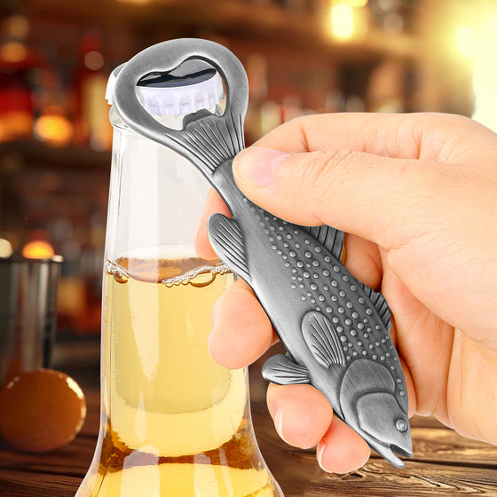 Hand opening a beer with the dark silver bass fish bottle opener in a bar