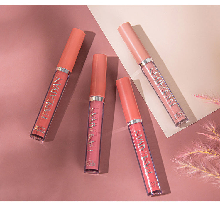 Six liquid lipstick shades swatched from nude to berry