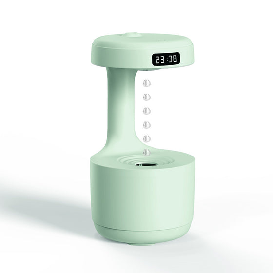 Anti-gravity air humidifier on a nightstand at night
